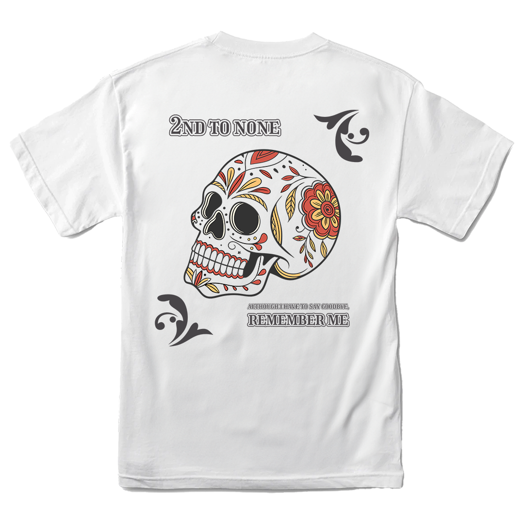 White t-shirt with a colorful skull design and text on the back