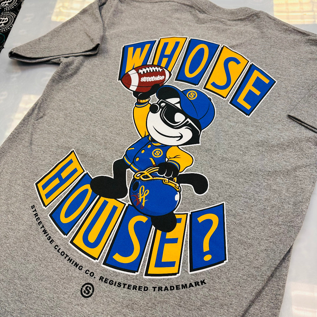 Gray t-shirt with cartoon character and 'Whose House?' text on a gray background